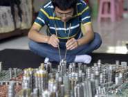 小夥用5萬枚硬幣堆出重慶城