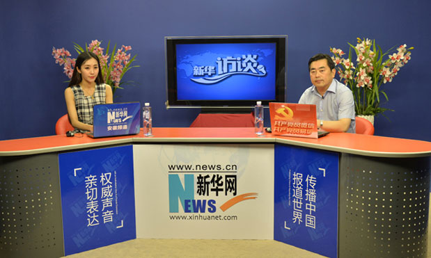 [新華訪談]全國優秀縣委書記對話錄：朱學亮