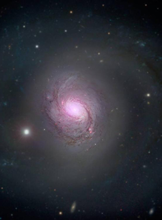 NASA拍螺旋星係 超大質量黑洞藏身宇宙塵埃